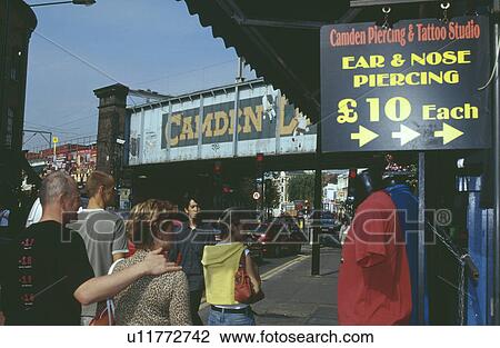 People walking through Camden Market in London View Large Photo Image Stock Image - People walking through Camden Market in London. Fotosearch