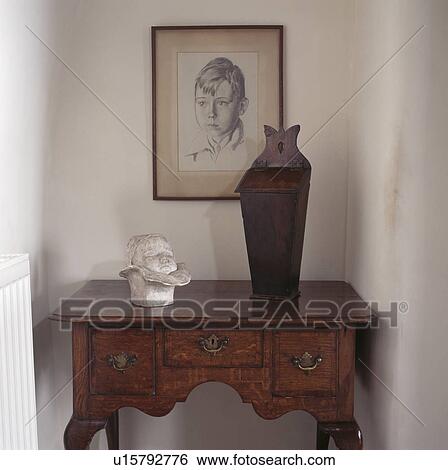 Picture above antique console table in white hall View Large Photo Image Stock Photograph - Picture above antique console table in white hall. Fotosearch