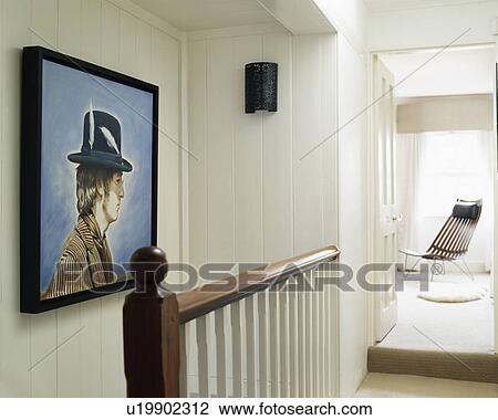 Stock Image - Picture on wall of traditional white landing. Fotosearch