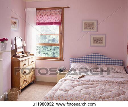 Pink blind on window in pastel pink country bedroom with pink quilt on bed View Large Photo Image Stock Image - Pink blind on window in pastel pink country bedroom with pink quilt on bed . Fotosearch