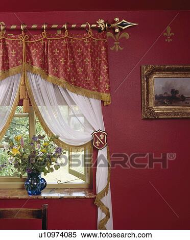 Red+gold fleur-de-Lis pelmet and pole on cottage window with fringed voile curtain View Large Photo Image Stock Photography - Red+gold fleur-de-Lis pelmet and pole on cottage window with fringed voile curtain. Fotosearch