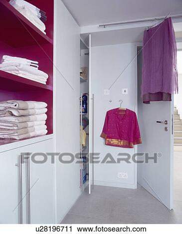 Stock Image - Shelving and storage in modern bathroom. Fotosearch
