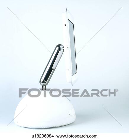 Sideways close-up of white Apple Macintosh 'Imac' computer View Large Photo Image Picture - Sideways close-up of white Apple Macintosh 'Imac' computer. Fotosearch