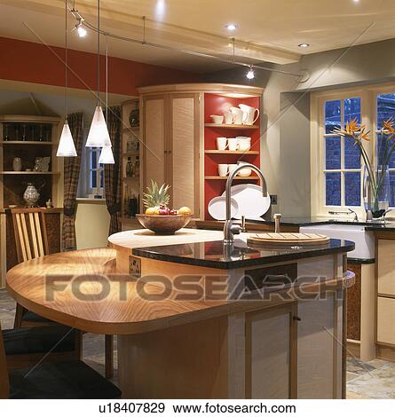 Sink in island unit in modern kitchen View Large Photo Image Stock Photo - Sink in island unit in modern kitchen. Fotosearch