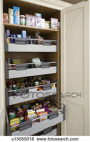 Slide-out drawers in large larder storage cupboard View Large Photo Image Stock Photo - Slide-out drawers in large larder storage cupboard. Fotosearch