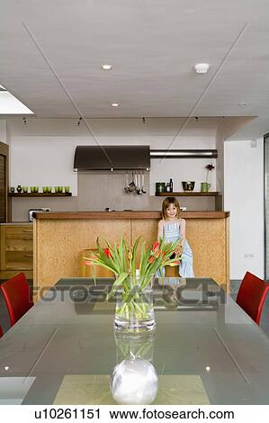 Small girl in modern kitchen dining room View Large Photo Image Stock Image - Small girl in modern kitchen dining room. Fotosearch