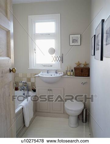 Small modern white bathroom View Large Photo Image Stock Photo - Small modern white bathroom. Fotosearch