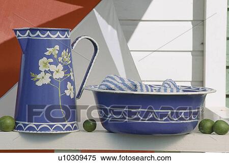 Still-Life of hand-painted blue enamel jug and bowl View Large Photo Image Stock Photography - Still-Life of hand-painted blue enamel jug and bowl. Fotosearch