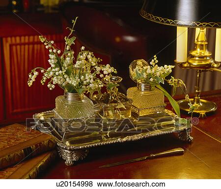 Still-Life of lillies-of-the-Valley on silver tray View Large Photo Image Stock Photo - Still-Life of lillies-of-the-Valley on silver tray. Fotosearch