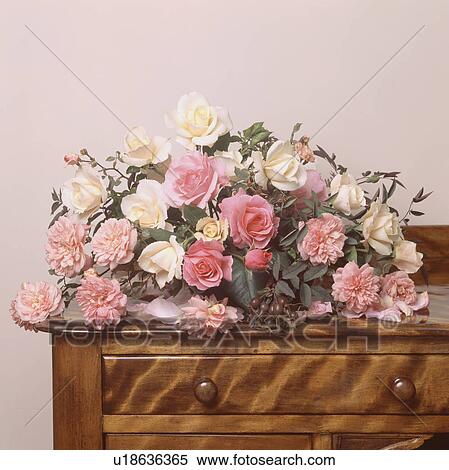 Stock Photography - Still-Life of pink roses in formal floral arrangement. Fotosearch