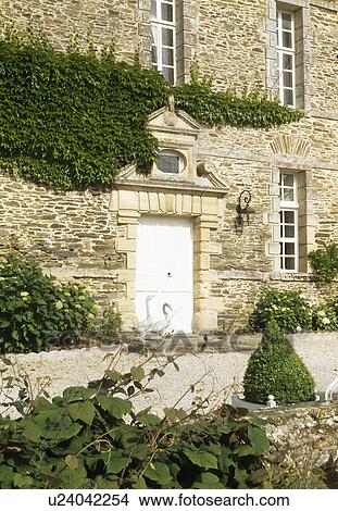 Stone pediment above white door in traditional French house in Normandy View Large Photo Image Picture - Stone pediment above white door in traditional French house in Normandy. Fotosearch