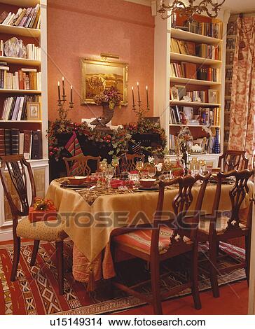 Table set for Christmas lunch in traditional country dining room View Large Photo Image Picture - Table set for Christmas lunch in traditional country dining room. Fotosearch
