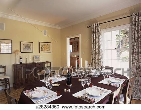 Table Set For Lunch In Traditional Cream Living Room Stock Image