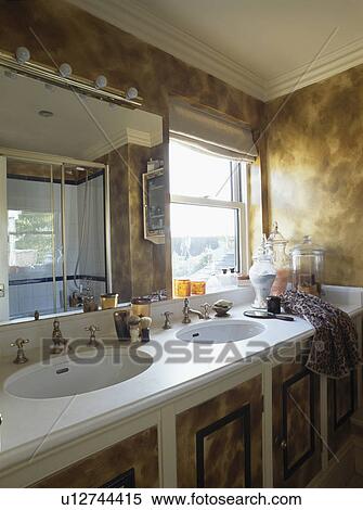Tortoishell paint-effect walls in bathroom with double basins in vanity unit View Large Photo Image Stock Photography - Tortoishell paint-effect walls in bathroom with double basins in vanity unit. Fotosearch