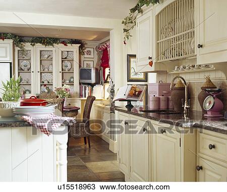 Traditional cream country kitchen View Large Photo Image Stock Image - Traditional cream country kitchen. Fotosearch