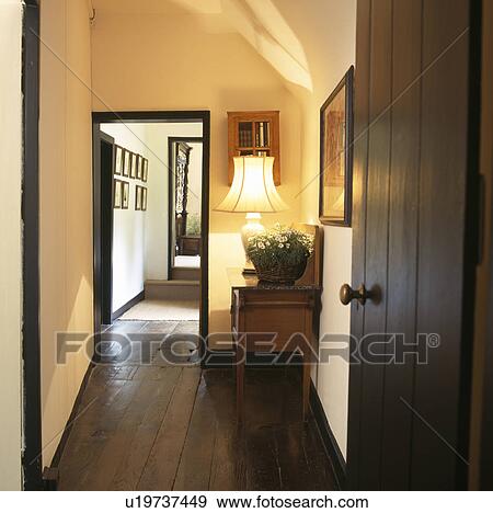 Traditional cream hall with wooden flooring View Large Photo Image Stock Photo - Traditional cream hall with wooden flooring. Fotosearch