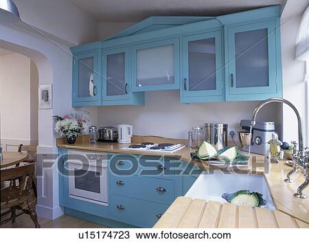 Traditional kitchen with turquoise fitted units View Large Photo Image Stock Image - Traditional kitchen with turquoise fitted units. Fotosearch