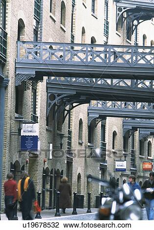 Stock Image - Traditional metal walkways above street in London. Fotosearch