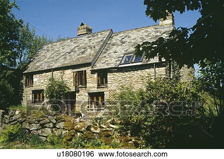 Traditional stone country cottage with small extension View Large Photo Image Stock Photograph - Traditional stone country cottage with small extension. Fotosearch