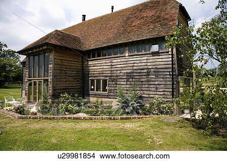 Picture - Traditional timbered barn conversion. Fotosearch