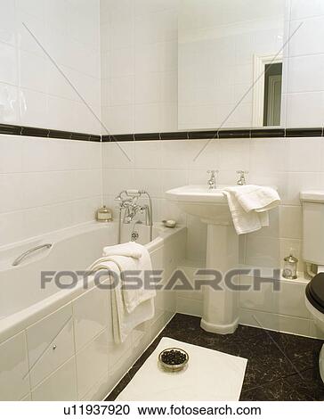 Traditional white tiled bathroom View Large Photo Image Stock Image - Traditional white tiled bathroom. Fotosearch