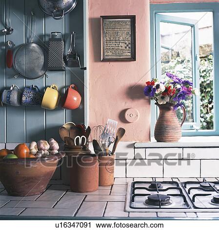 Utensils in pottery bowls on white-tiled worktop View Large Photo Image Stock Image - Utensils in pottery bowls on white-tiled worktop. Fotosearch