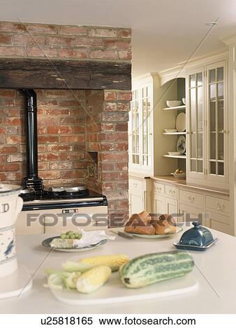 Vegetables on table in cottage kitchen View Large Photo Image Stock Photography - Vegetables on table in cottage kitchen. Fotosearch