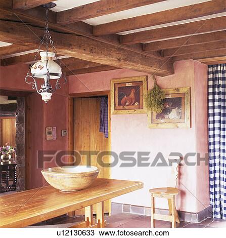 Victorian glass lamp above table in pink cottage dining room View Large Photo Image Stock Image - Victorian glass lamp above table in pink cottage dining room. Fotosearch