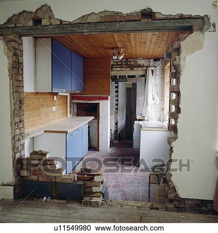 Wall knocked through in kitchen before renovation View Large Photo Image Stock Image - Wall knocked through in kitchen before renovation. Fotosearch