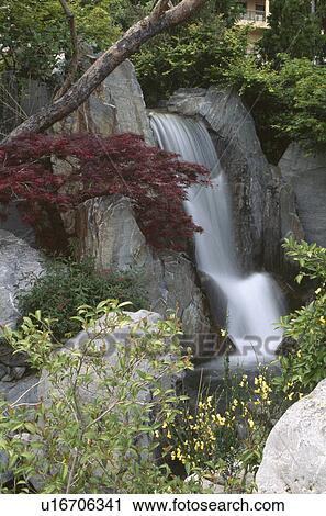 Waterfall in country garden View Large Photo Image Stock Image - Waterfall in country garden. Fotosearch