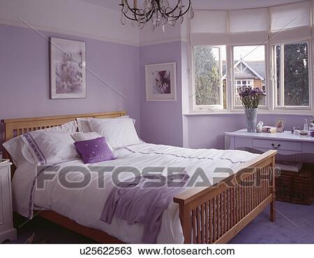 Stock Photo Of White Bedlinen On Wooden Bed In Mauve Bedroom Stock Photo White Bedlinen On Wooden Bed In Mauve Bedroom Fotosearch Search
