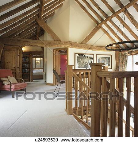 White carpet on landing of barn conversion with beamed apex ceiling View Large Photo Image Stock Photo - White carpet on landing of barn conversion with beamed apex ceiling. Fotosearch