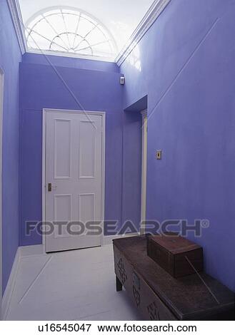 White door in blue hall View Large Photo Image Stock Photo - White door in blue hall. Fotosearch