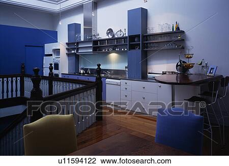 White fitted units in modern blue and white kitchen View Large Photo Image Stock Image - White fitted units in modern blue and white kitchen. Fotosearch