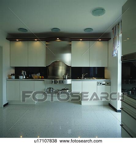 White flooring in modern white kitchen View Large Photo Image Stock Photo - White flooring in modern white kitchen. Fotosearch