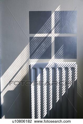 Stock Image - White radiator in small white4 hall. Fotosearch