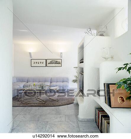 White Seventies Living Room With Marble Tiled Floor And