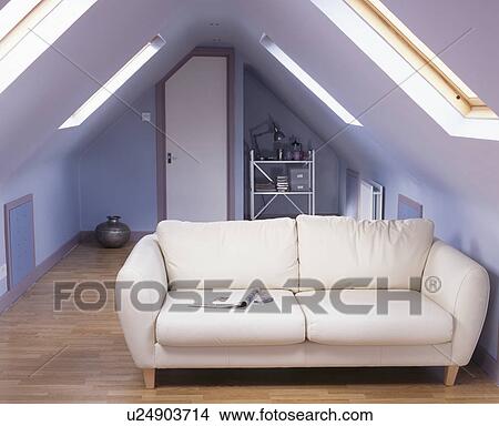 White sofa in small blue living room in modern loft conversion View Large Photo Image Picture - White sofa in small blue living room in modern loft conversion. Fotosearch