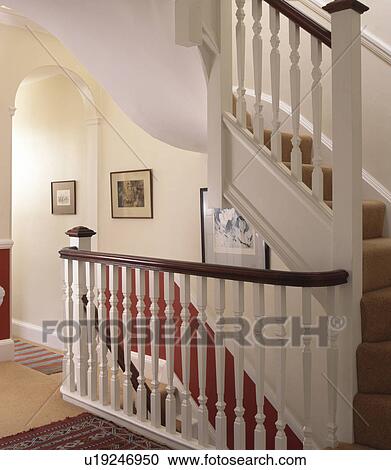 White staircase in traditional townhouse hall View Large Photo Image Stock Image - White staircase in traditional townhouse hall. Fotosearch