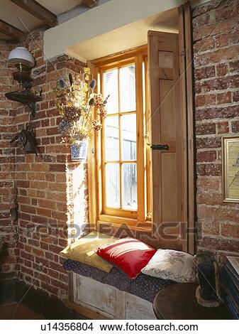 Picture - Window-seat hit by sunlight.. Fotosearch