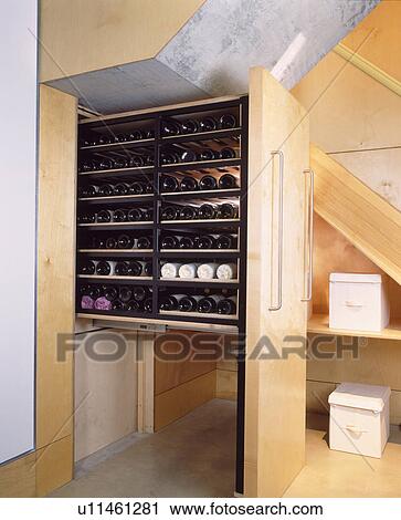 Stock Image - Wine storage in modern kitchen. Fotosearch