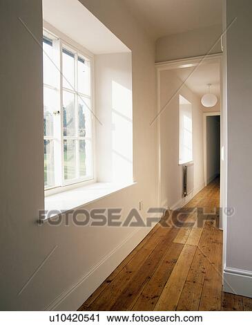 Wooden flooring in empty hall corridor View Large Photo Image Stock Image - Wooden flooring in empty hall corridor. Fotosearch