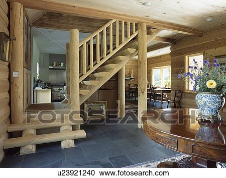 Wooden staircase in hall with blue carpet View Large Photo Image Stock Image - Wooden staircase in hall with blue carpet. Fotosearch