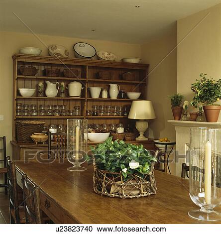 Wooden table and large dresser in traditional townhouse dining room View Large Photo Image Stock Image - Wooden table and large dresser in traditional townhouse dining room . Fotosearch