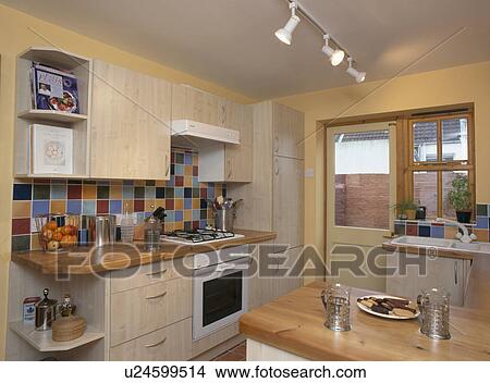Yellow economy style kitchen View Large Photo Image Picture - Yellow economy style kitchen. Fotosearch