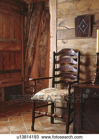 Stock Image - Antique chair in traditional hall. Fotosearch