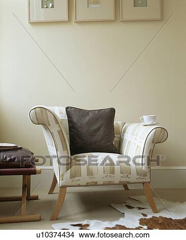 Beige striped armchair in modern white living room View Large Photo Image Picture - Beige striped armchair in modern white living room. Fotosearch