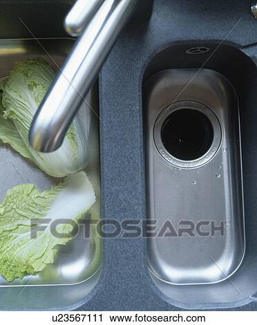 Birdseye close-up of stainless steel sink with small drainer View Large Photo Image Stock Image - Birdseye close-up of stainless steel sink with small drainer. Fotosearch