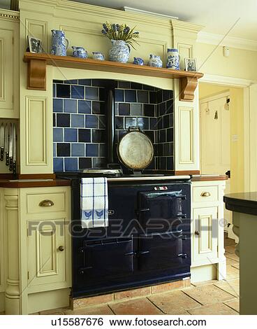 Black Aga oven in traditional country kitchen View Large Photo Image Stock Photograph - Black Aga oven in traditional country kitchen. Fotosearch
