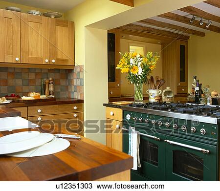 Black range oven in traditional cottage kitchen View Large Photo Image Stock Image - Black range oven in traditional cottage kitchen. Fotosearch